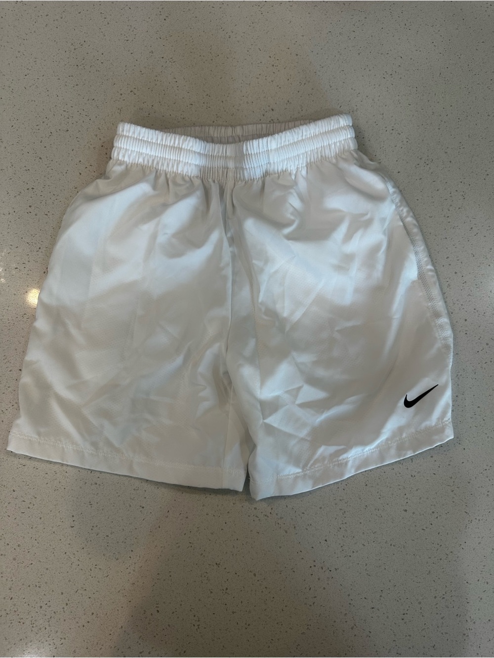 Youth Nike White Athletic Shorts with Black Swoosh
